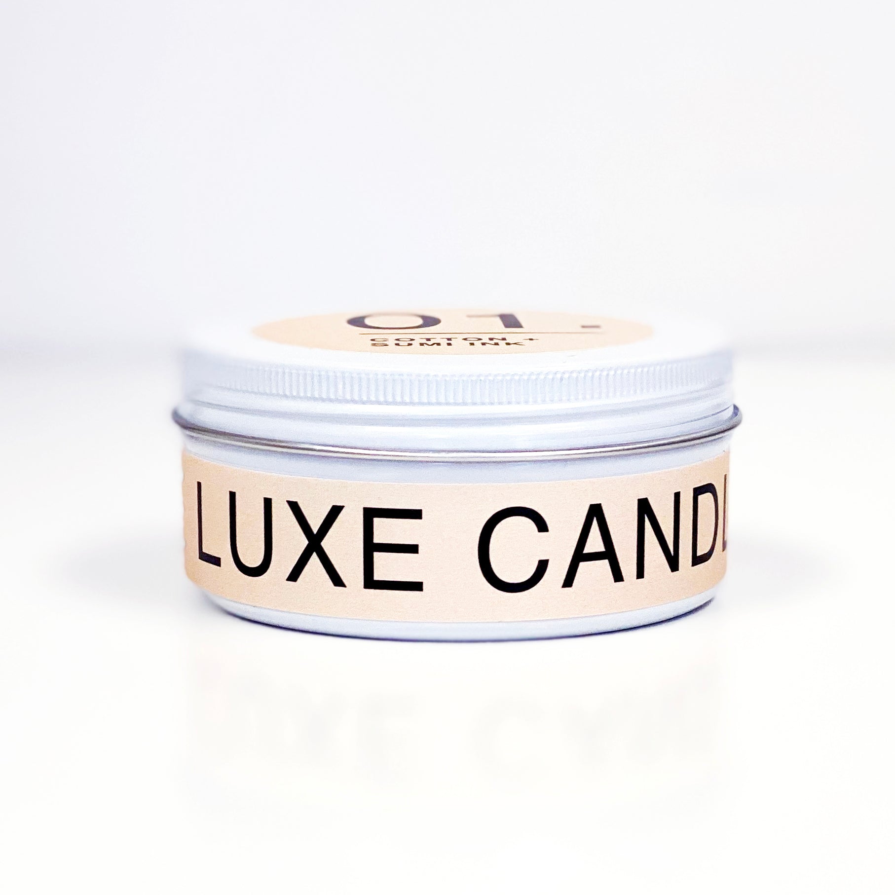 White and blush scented travel candle tin | The Luxe Candle Co