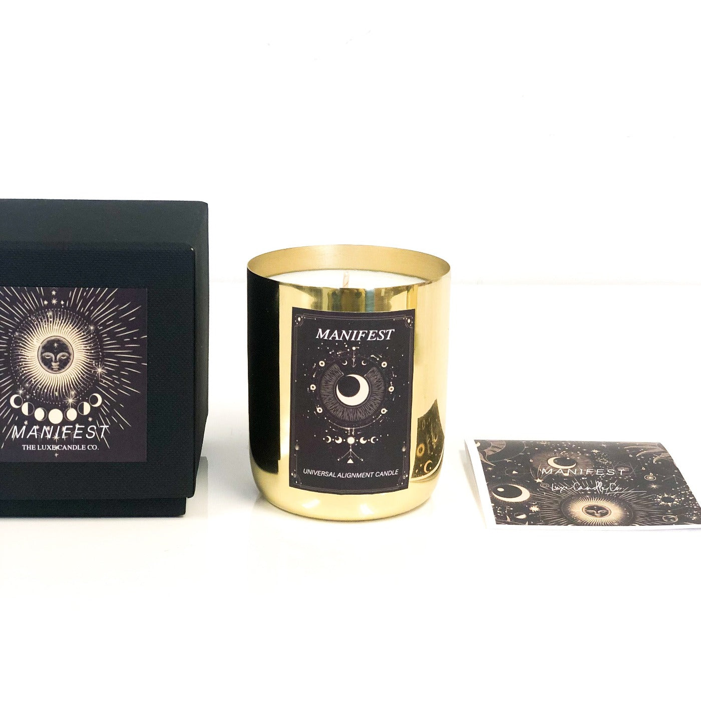 Gold candle scented with Palo Santo to manifest, align with universal energy and get back to you by The Luxe Candle Co