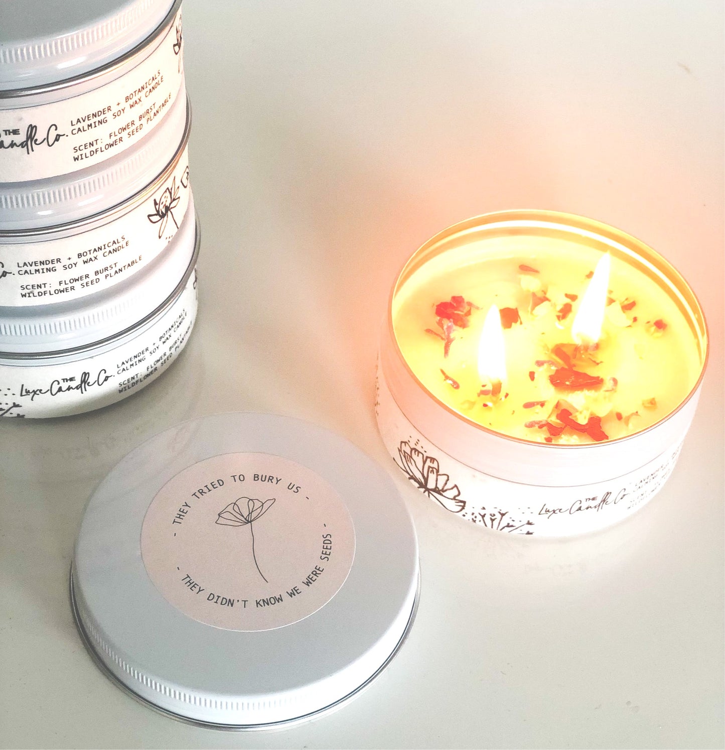THEY DIDN’T KNOW WE WERE SEEDS . Scented flower burst soy candle with plantable wildflower label
