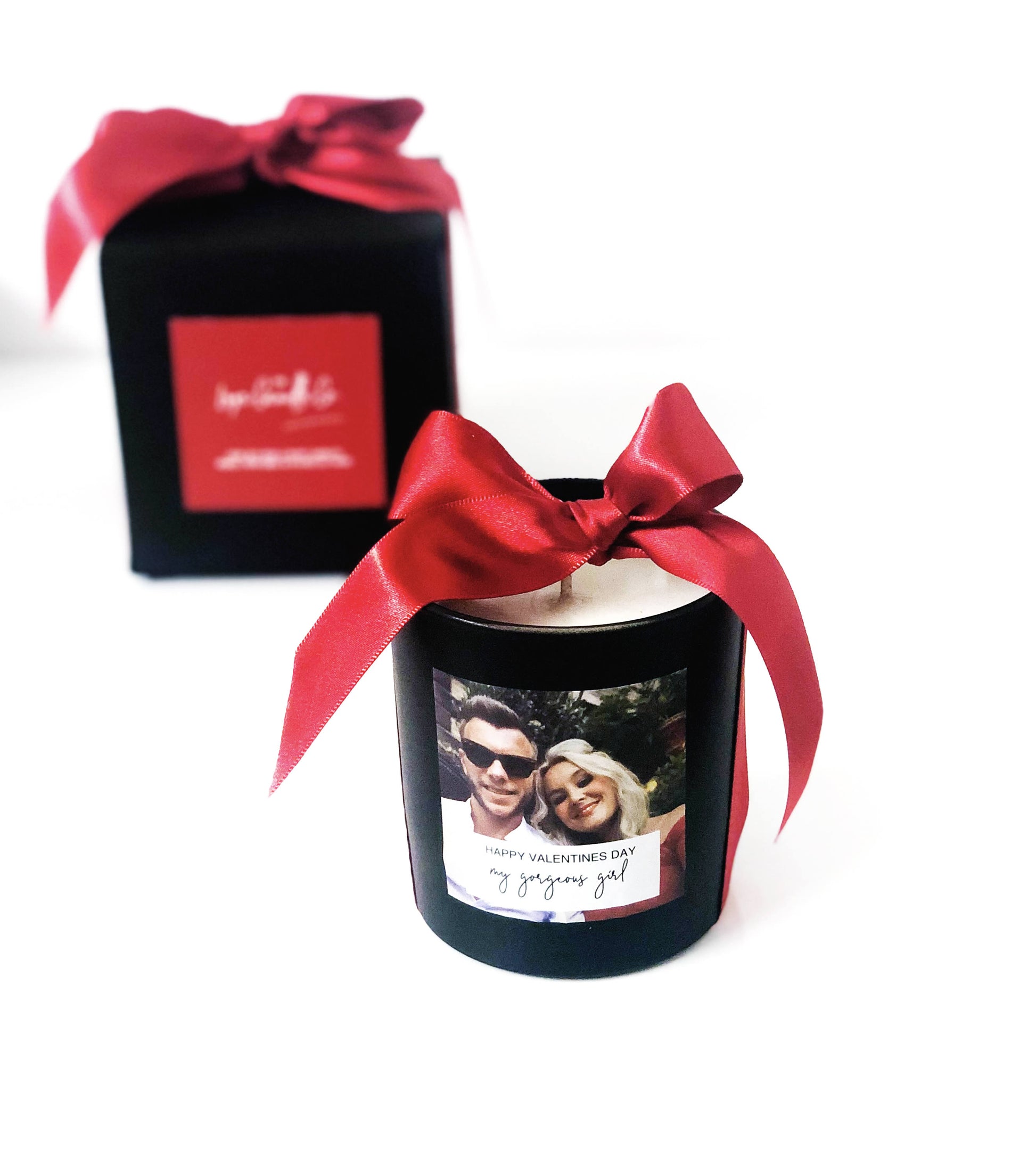 Personalised photo candle valentines gift in black soy wax with big red satin bow