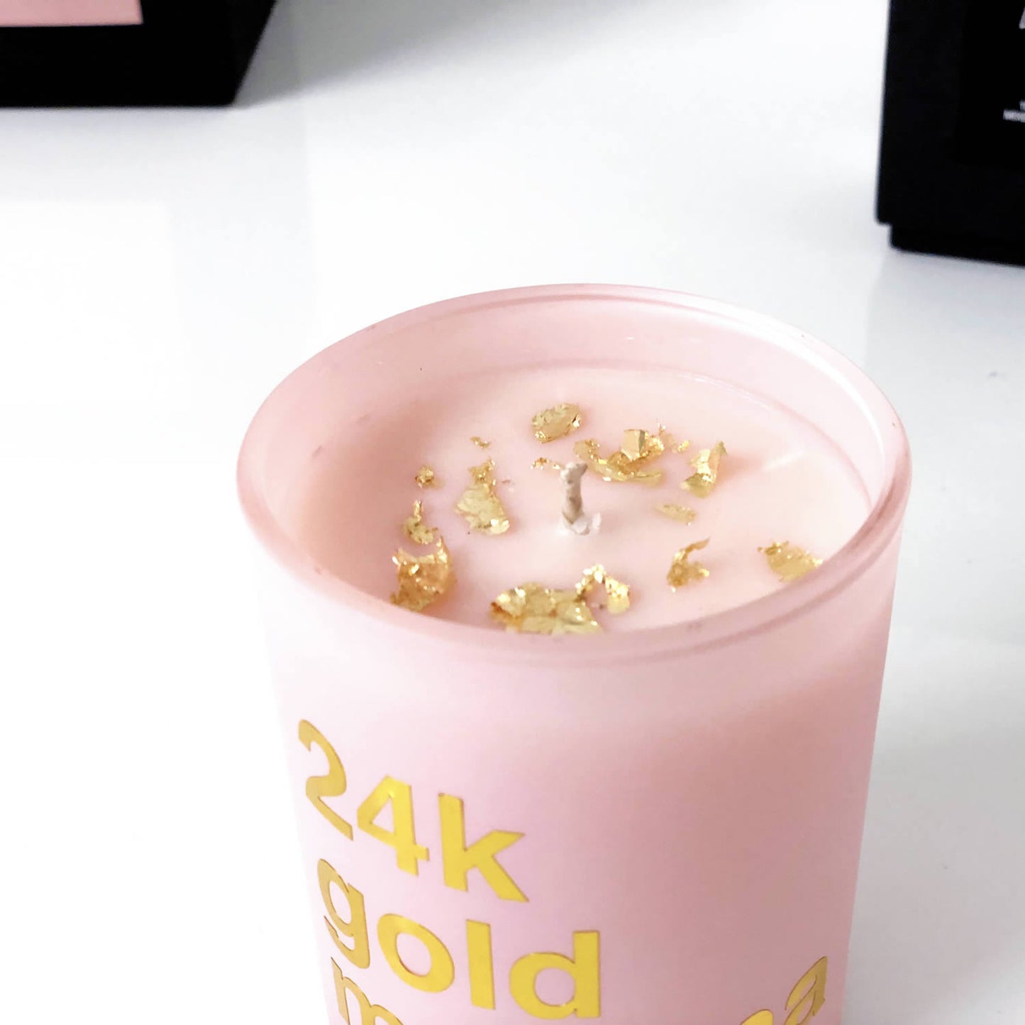 pink and gold candle