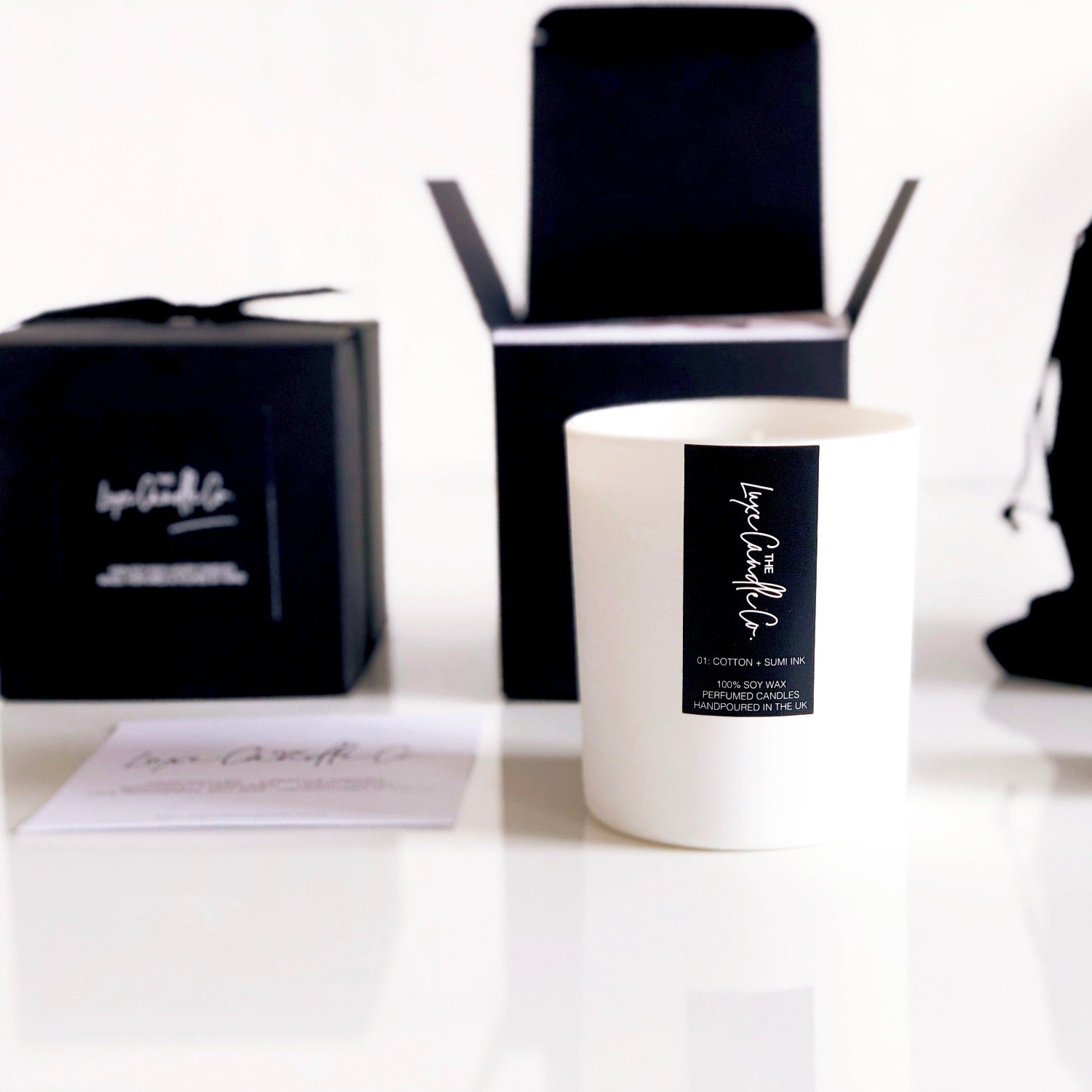 Luxury black and white soy wax candles for stylish monochrome interiors